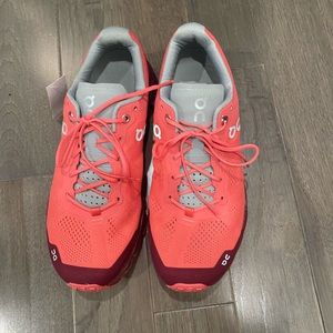 Coral on cloud tennis shoes